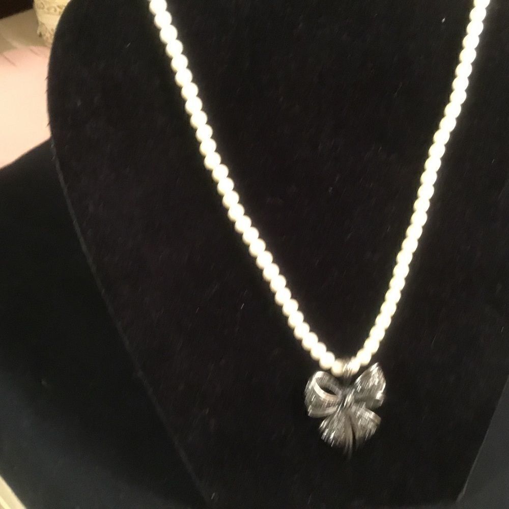 White Faux Pearl Necklace With Silvertone Bow